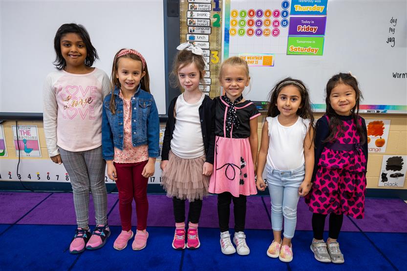 Students dressed in '50s wear smile